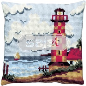 kruissteekkussen strandgezicht met vuurtoren