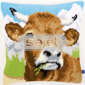 kruissteekkussen grazende koe